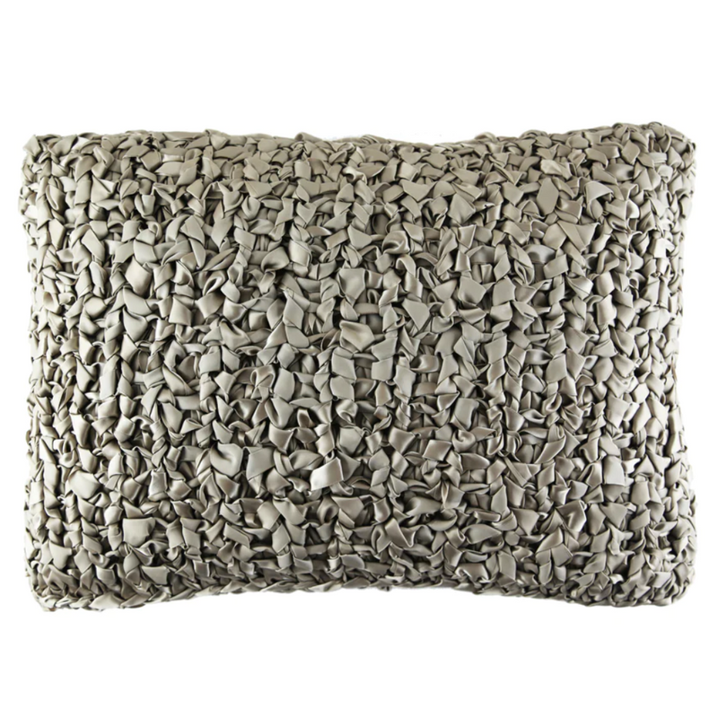 Coussin décoratif en tricot à rubans